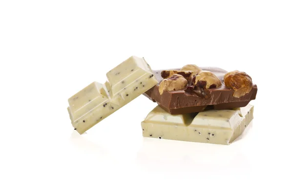 Slices of white and dark chocolate — Stock Photo, Image