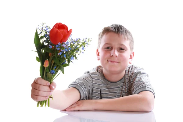 Happy teenager with bouquet of flowers — Stock Photo, Image