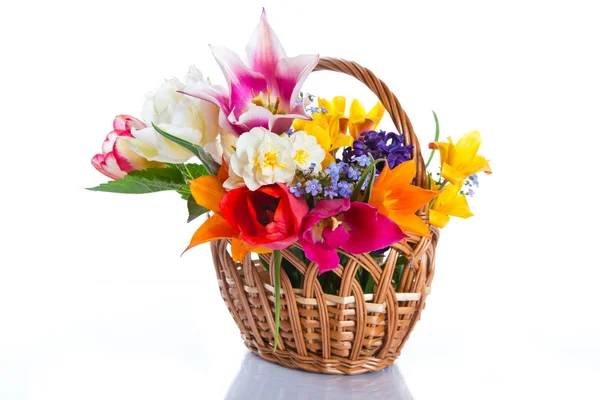 Bouquet of flowers in a basket — Stock Photo, Image