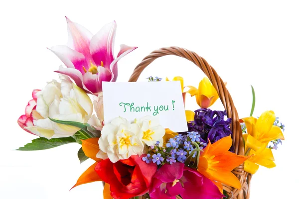 Bouquet of flowers in a basket — Stock Photo, Image