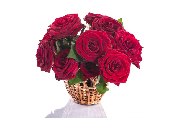 Roses in a wicker basket Royalty Free Stock Images