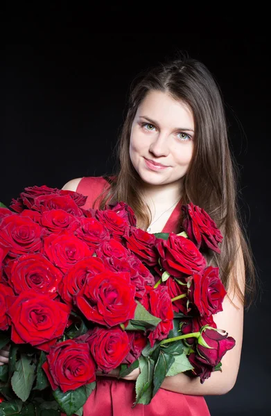 Beautiful girl with roses — Stock Photo, Image