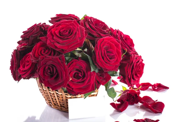 Roses in a wicker basket — Stock Photo, Image