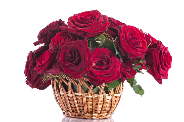 Roses in a wicker basket Stock Photo