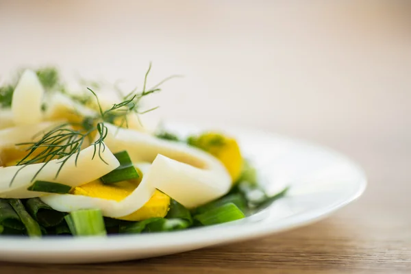 Salad with squid and eggs — Stock Photo, Image