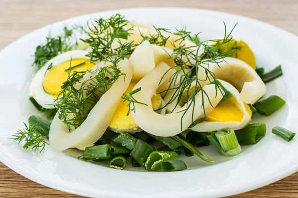 Salad with squid and eggs — Stock Photo, Image