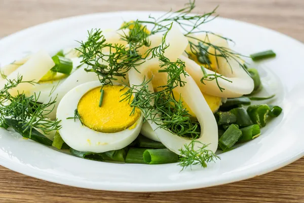 Salad with squid and eggs — Stock Photo, Image