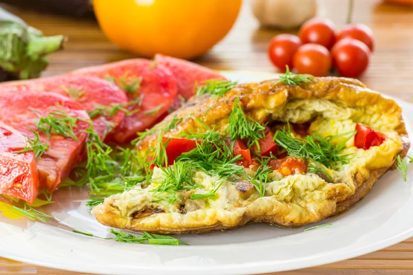 Omelet with vegetables — Stock Photo, Image