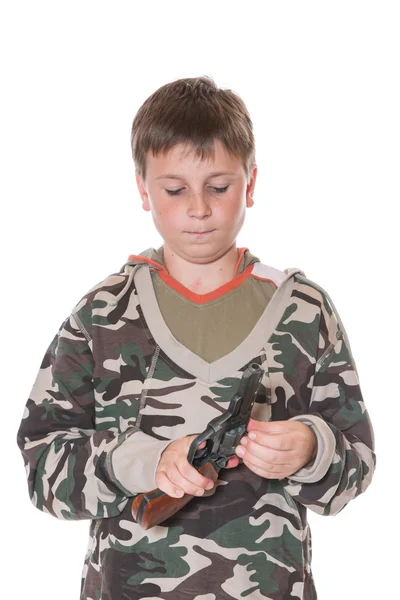 Teenager with a gun — Stock Photo, Image