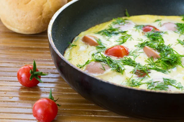 Scrambled eggs with tomatoes — Stock Photo, Image