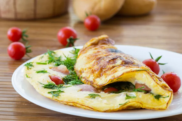 Scrambled eggs with tomatoes — Stock Photo, Image