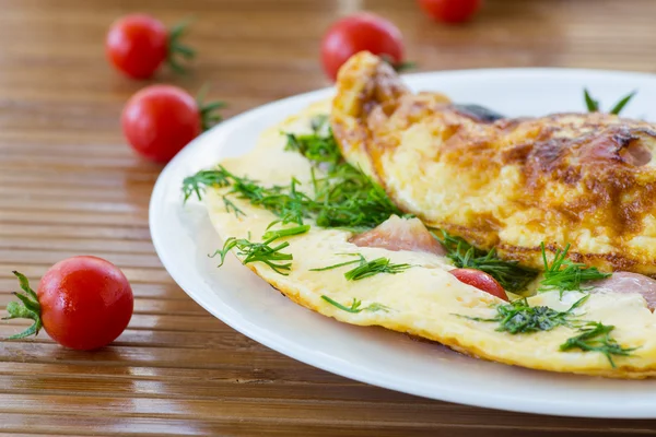 Scrambled eggs with tomatoes — Stock Photo, Image