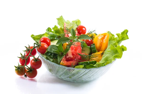 Salad with fresh cucumbers and tomatoes Stock Picture