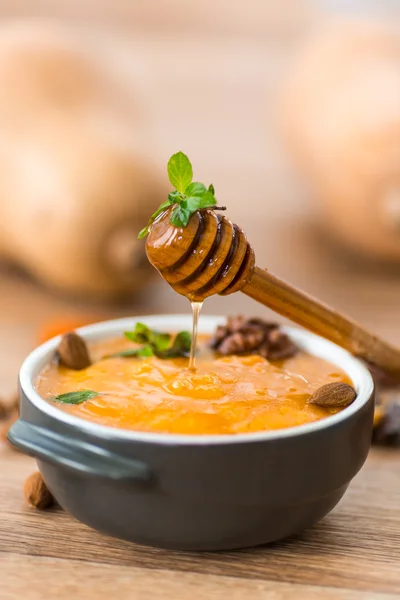 Pumpkin porridge with honey — Stock Photo, Image