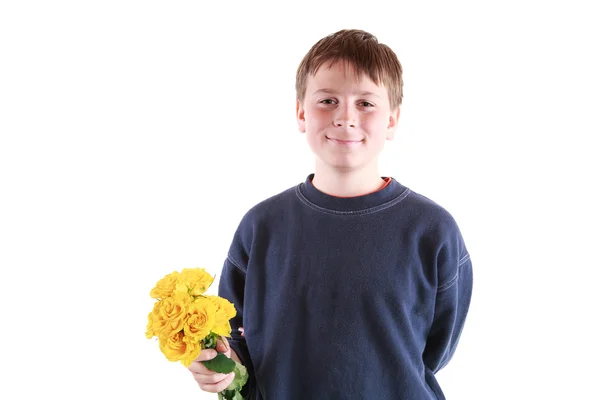 Niedlicher Teenager mit Blumen — Stockfoto