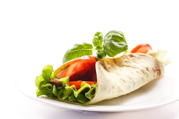 Pita bread with lettuce, salami and tomatoes — Stock Photo, Image