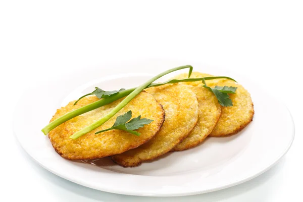Fried potato pancakes on a plate — Stock Photo, Image
