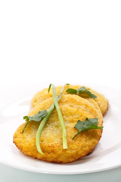 Fried potato pancakes on a plate — Stock Photo, Image