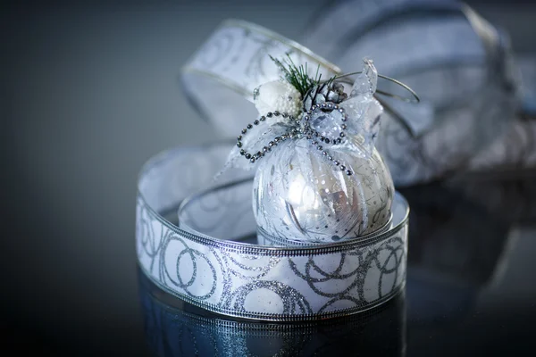 Christmas card with silver balls and ribbon — Stock Photo, Image