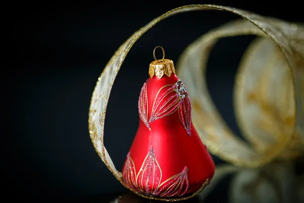 Christmas bell with gold ribbon — Stock Photo, Image