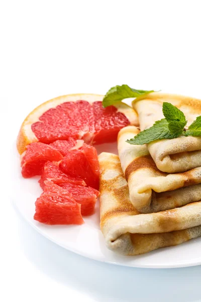 Pancakes with grapefruit — Stock Photo, Image