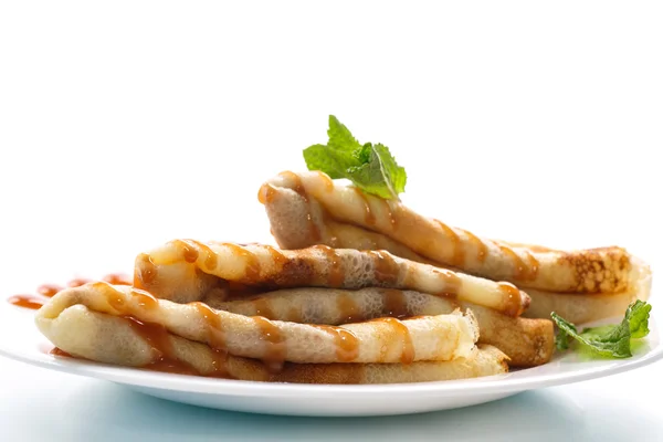 Pancakes with syrup and mint — Stock Photo, Image