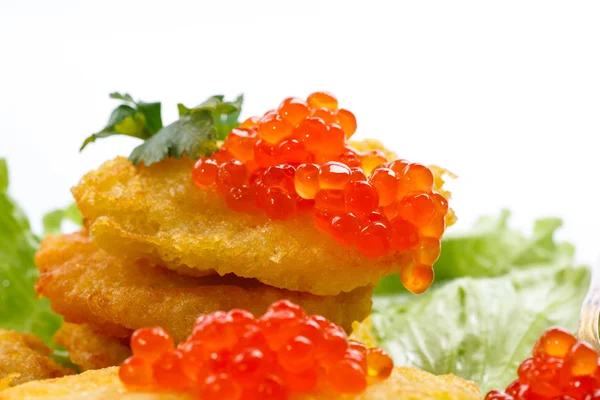 Potato pancakes with red caviar — Stock Photo, Image