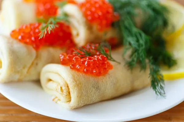 Pancakes with red caviar — Stock Photo, Image