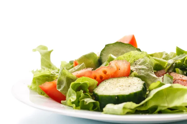 Fresh salad with cucumbers and tomatoes — Stock Photo, Image