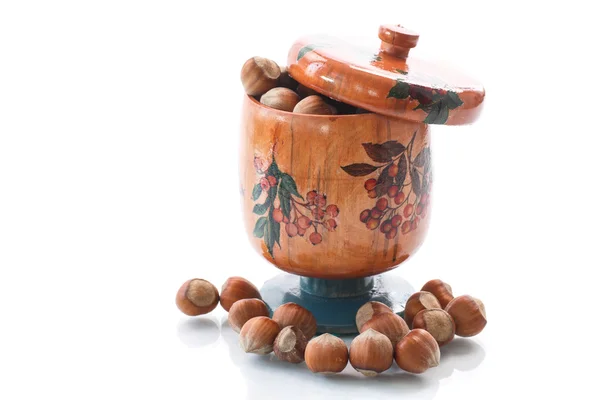 Hazelnut brown in wooden pot — Stock Photo, Image