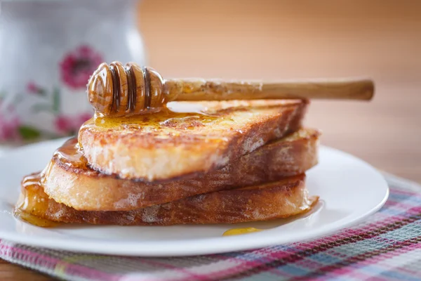 Sweet toast with honey — Stock Photo, Image