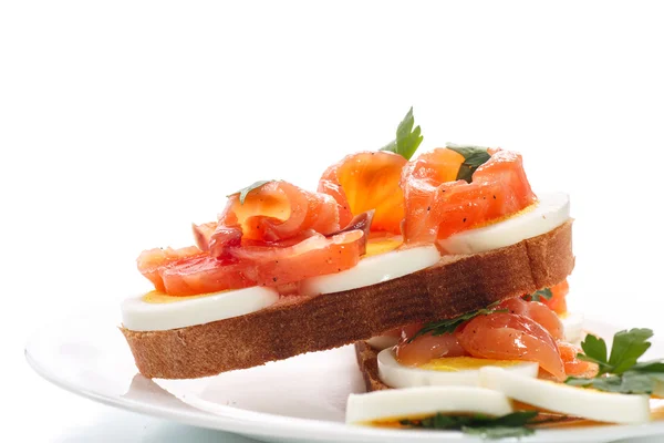 Sandwich with egg and salmon — Stock Photo, Image