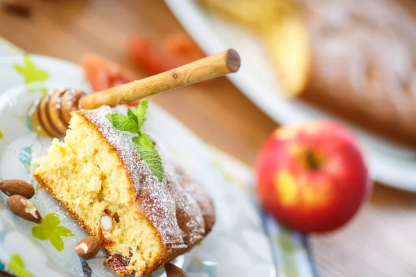 Sponge cake with dried apricots and almonds — Stock Photo, Image