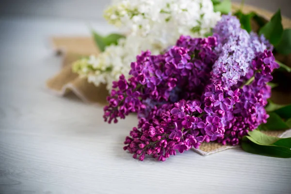 Bouquet Beautiful Spring Lilacs Different Colors Wooden Table — Φωτογραφία Αρχείου