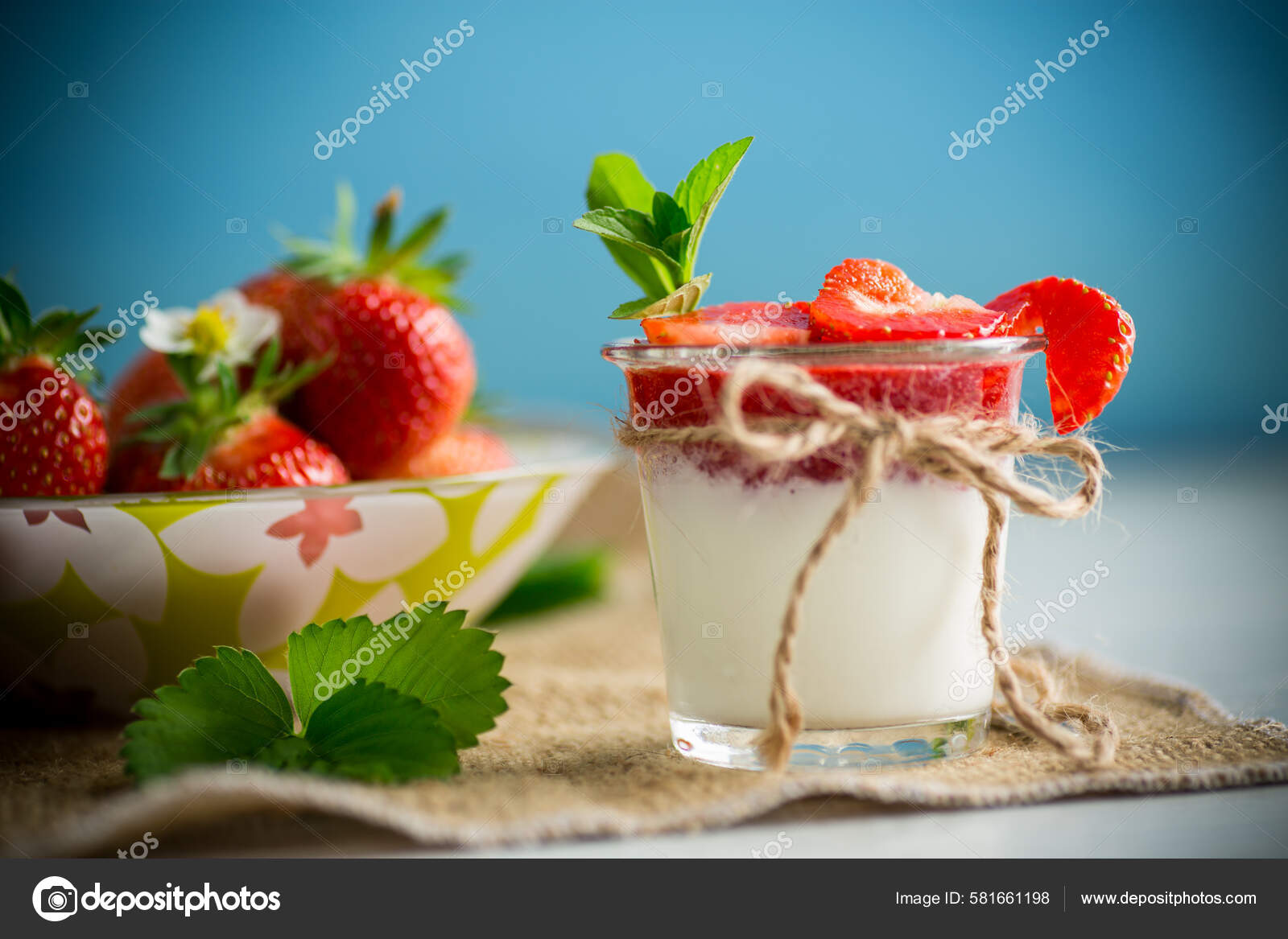 https://st.depositphotos.com/1011812/58166/i/1600/depositphotos_581661198-stock-photo-sweet-homemade-yogurt-strawberry-jam.jpg