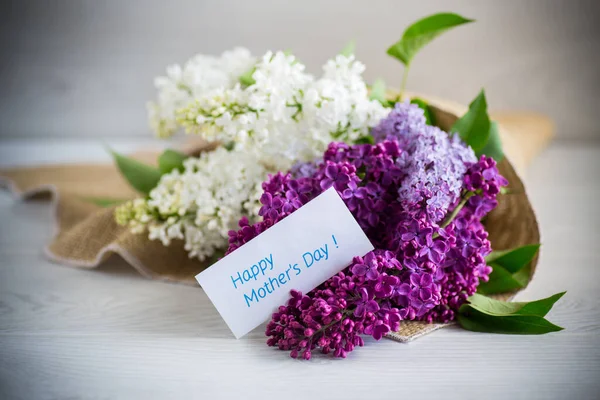 Bouquet Beautiful Spring Lilacs Different Colors Wooden Table — стоковое фото