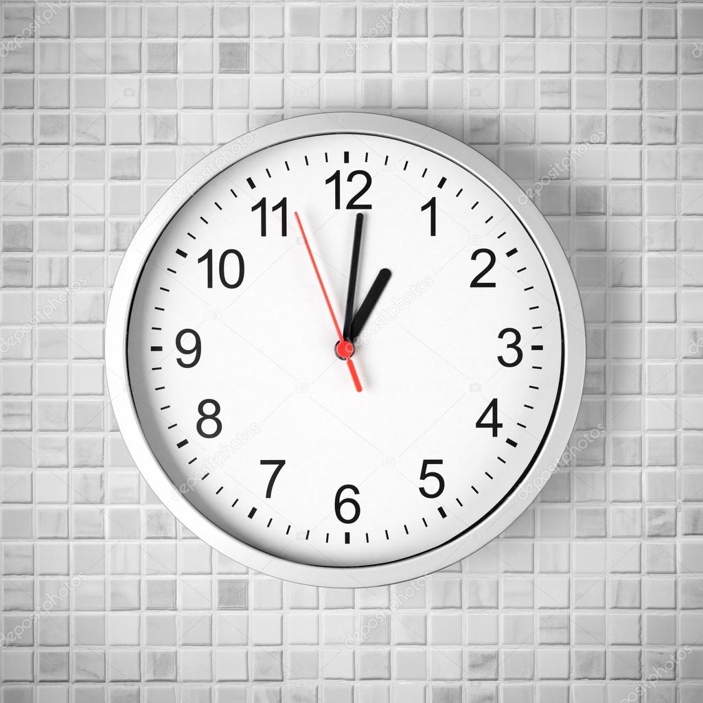 Simple Clock Or Watch On White Tile Wall Displaying One O Stock Photo By C Andrey Kuzmin Simple Clock Or Watch On White Tile Wall Displaying One O Stock Photo By C Andrey Kuzmin