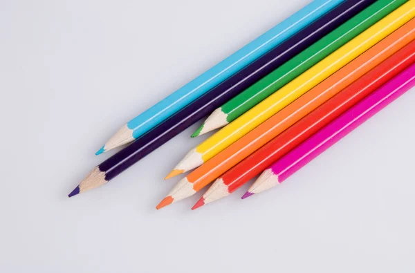 Colorful pencils on a white background close-up — Stock Photo, Image