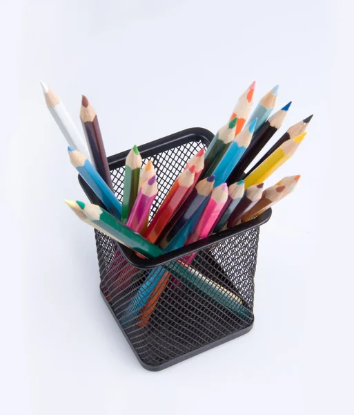 Colorful pencils in a holder on a white background close-up — Stock Photo, Image