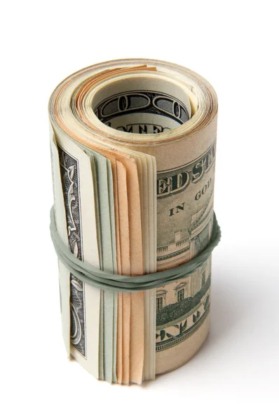 Pack of dollars is twisted into a roll — Stock Photo, Image