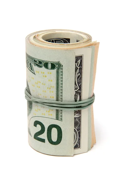 Pack of dollars is twisted into a roll — Stock Photo, Image