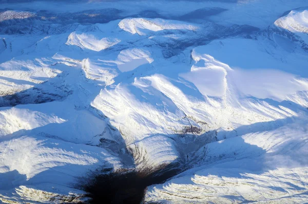 Vista sulle montagne dall'aereo — Foto Stock