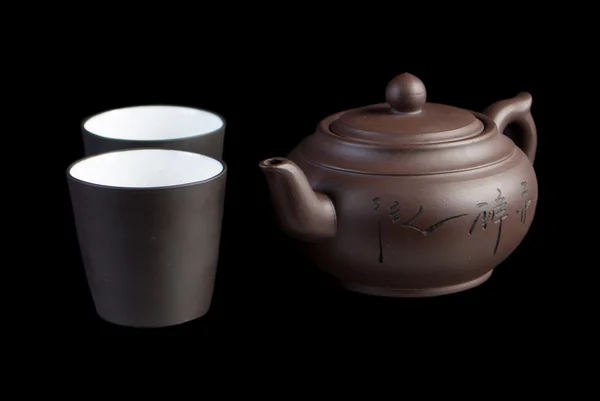 Китайский чайник с чашкой — стоковое фото