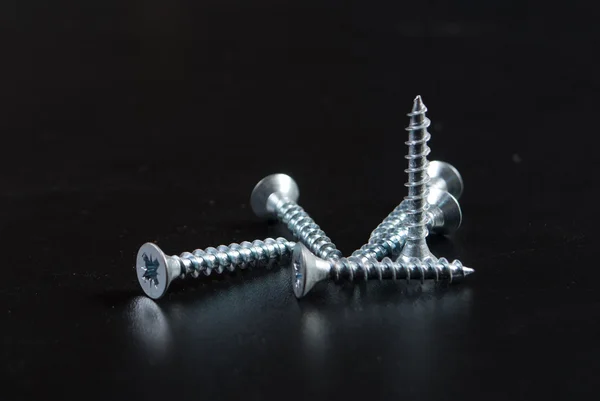 Screws and screwdriver — Stock Photo, Image