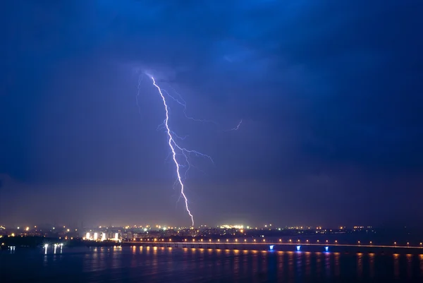 View of a lightning over city at night — Stock Photo, Image