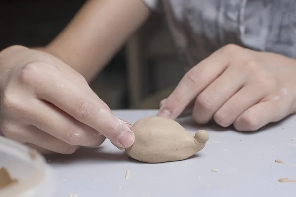 Girl make toyfrom clay — Stock Photo, Image