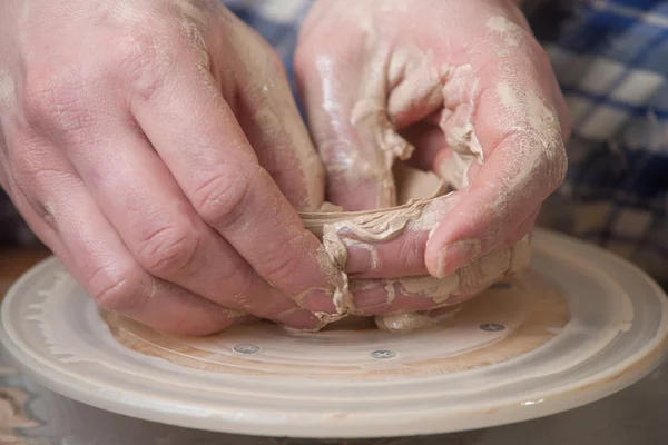 Hands of a potter — Stock Photo, Image