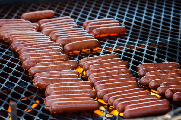 Korv på grillen Stockbild