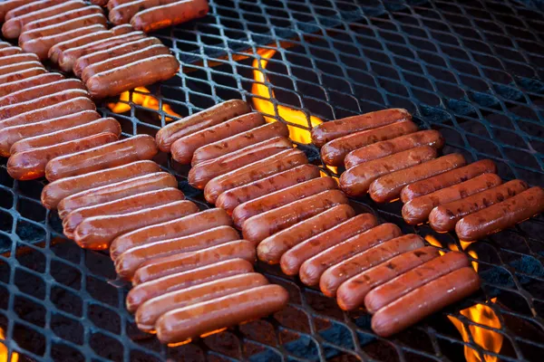 Hot Dogs On The Grill Royalty Free Stock Photos