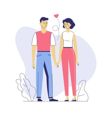 Doğada yan yana duran iki genç erkek ve kadın.